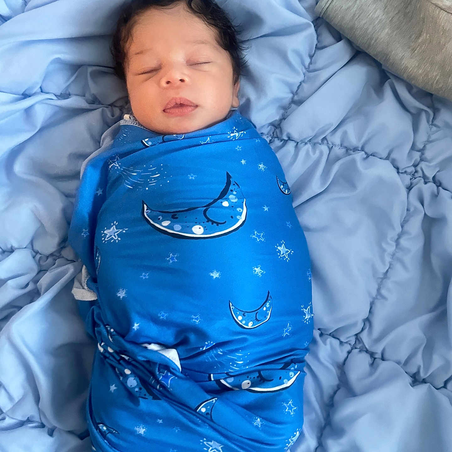 Aidan Jr joined the competition — help win amazing prizes! baby, blue_blanket, closed_eyes, cozy, cute, face, indoor, infant, lying_down, moon_pattern, newborn, peaceful, portrait, quilt, resting, sleeping, soft_texture, stars, swaddle, wrapped