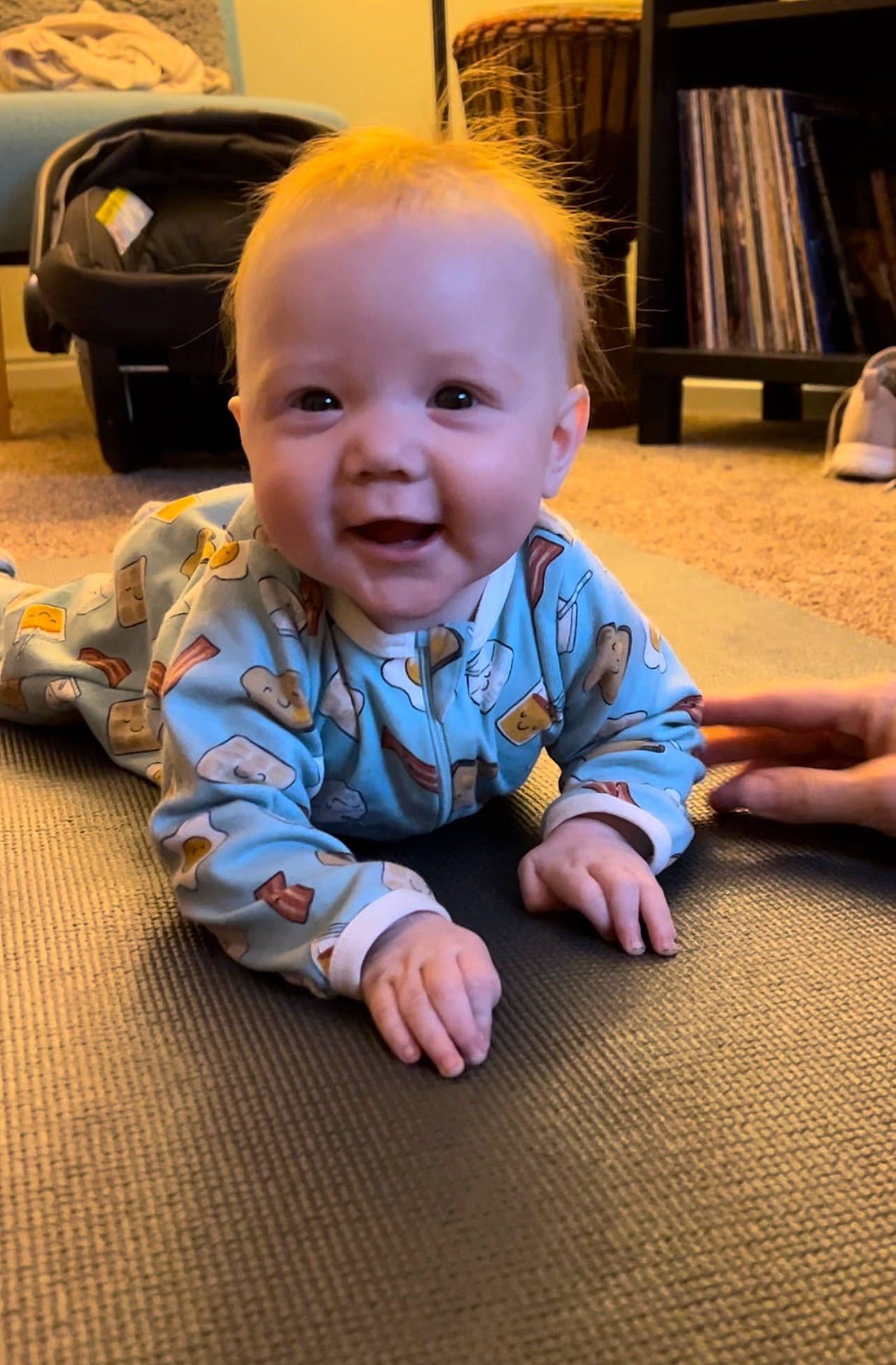 Ayla is registered to the contest to win money with this photo: baby, baby_toddler_clothing, cheek, chin, eye, facial_expression, finger, floor, flooring, hairstyle, happy, hardwood, head, iris, joy, mammal, nose, person, skin, smile