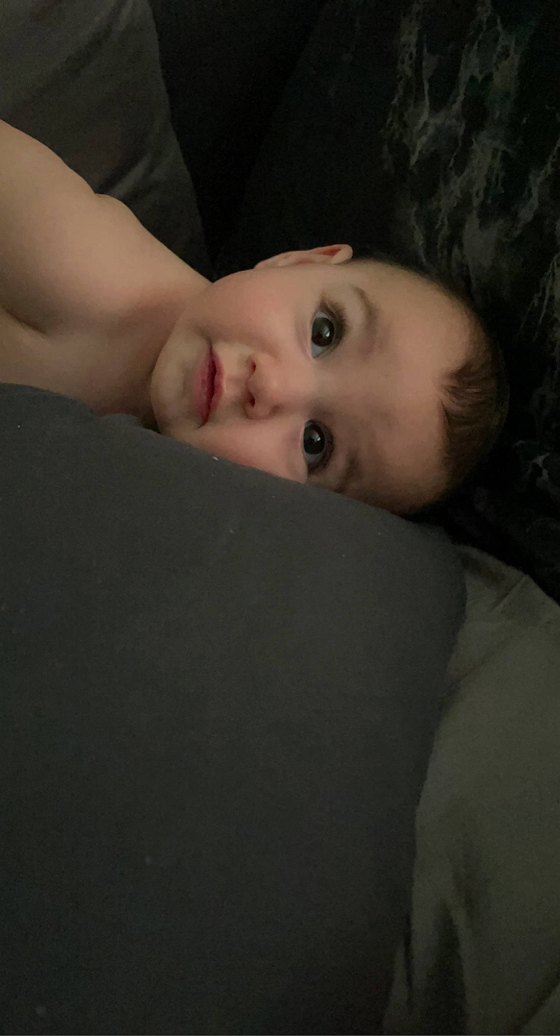 Aqua is registered to the contest to win money with this photo: black_hair, cheek, child, comfort, couch, darkness, eyebrow, eyelash, flash_photography, fur, hair, iris, lip, long_hair, mouth, neck, nose, person, portrait_photography, toddler