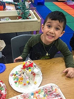 Christopher is registered to the contest to win money with this photo: birthday_cake, cake, cake_decorating, chair, child, cuisine, dish, dishware, event, food, fun, ingredient, joy, person, plate, recipe, recreation, sharing, smile, table