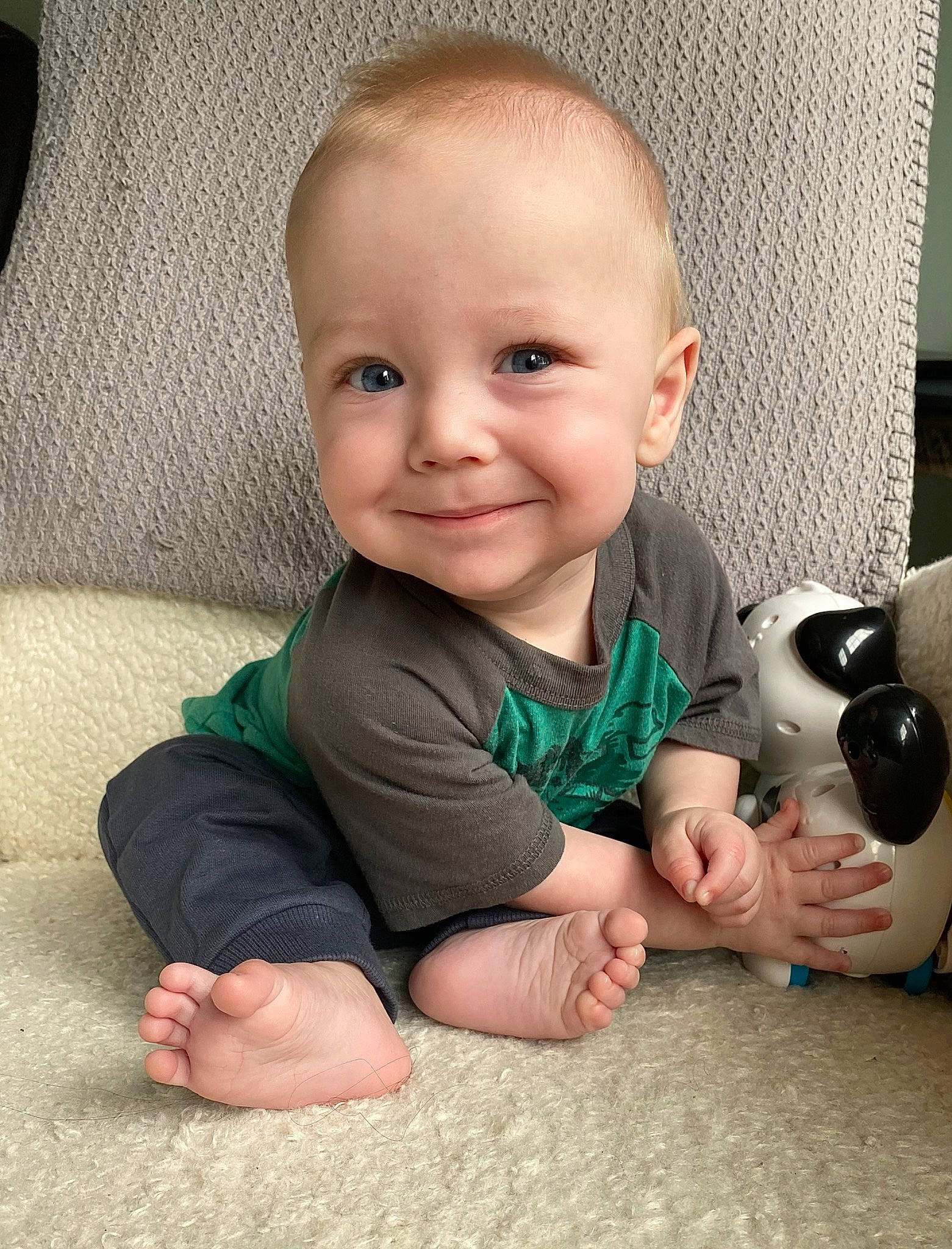 Hudson joined the competition — help win amazing prizes! arm, baby, baby_toddler_clothing, cheek, child, comfort, eye, finger, flooring, foot, happy, iris, joy, mammal, nail, nose, person, skin, sleeve, smile