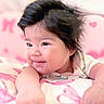 baby, child, smiling, face, hair, blanket, pink, cute, cheeks, lying_down, infant, portrait, happy, indoors, soft, cozy, skin, expression, person, warm