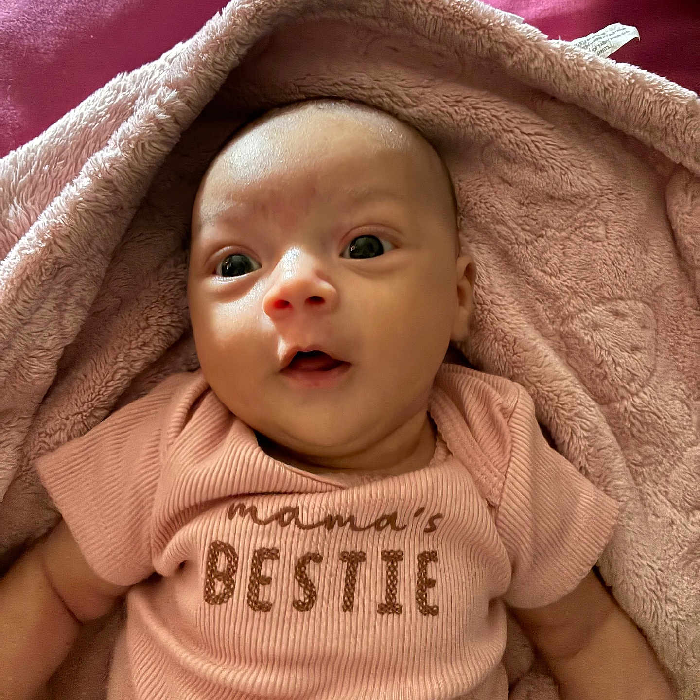 Anastasia joined the competition — help win amazing prizes! baby, infant, pink_blanket, pink_clothing, onesie, soft_texture, wrapped, cute, portrait, child, face, skin, expression, newborn, indoors, lying_down, cozy, happy, person, sleepwear