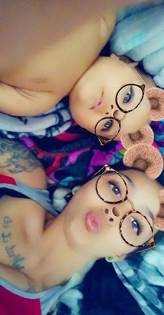 Leona is registered to the contest to win money with this photo: baby, brown_hair, cheek, child, finger, fun, glasses, head, leg, lip, nose, person, skin, smile, toddler, toy