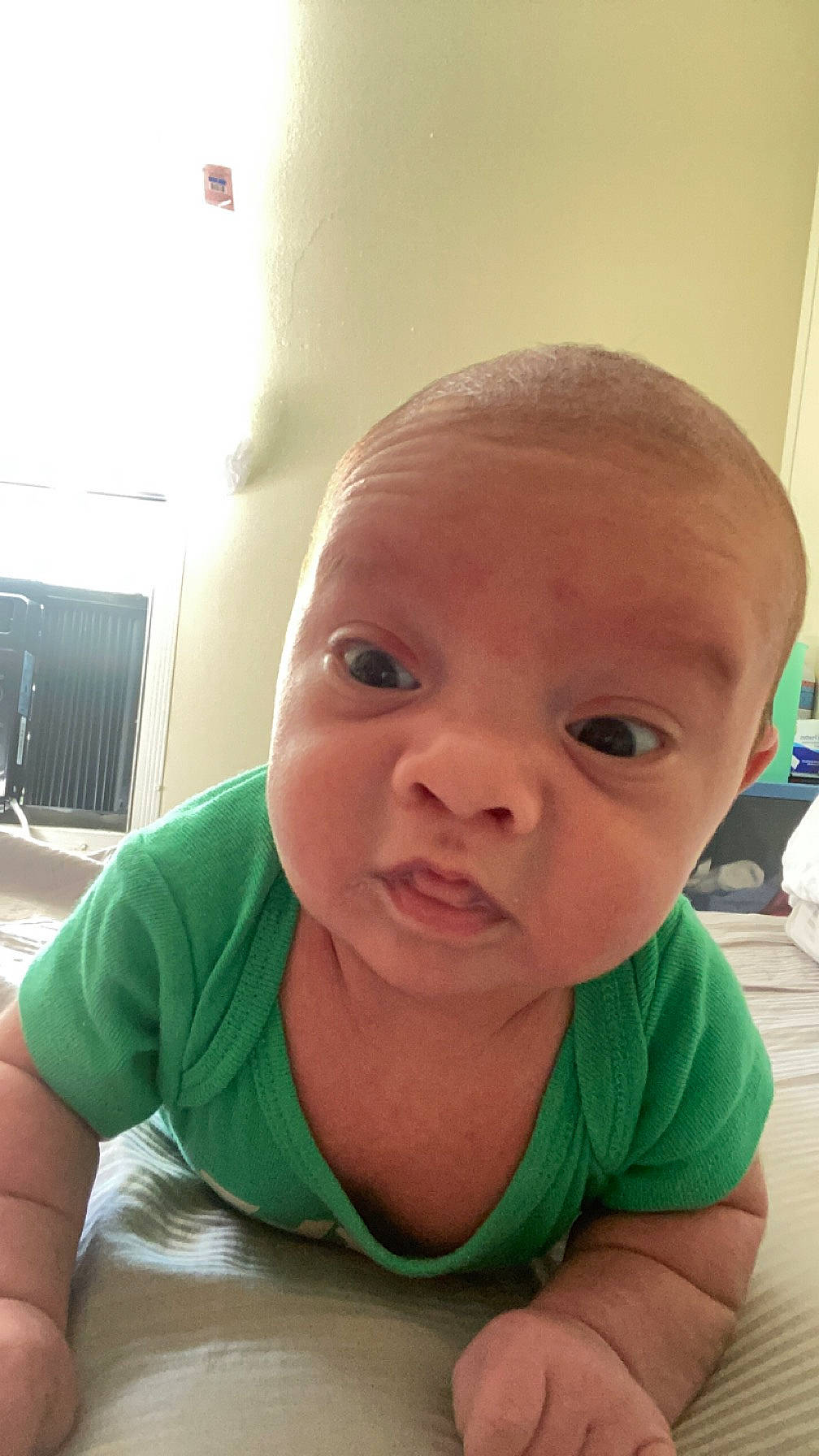 Braylen is registered to the contest to win money with this photo: baby, baby_toddler_clothing, cheek, ear, eyelash, finger, flooring, gesture, happy, iris, jaw, lip, mouth, neck, nose, person, skin, sleeve, smile, thumb