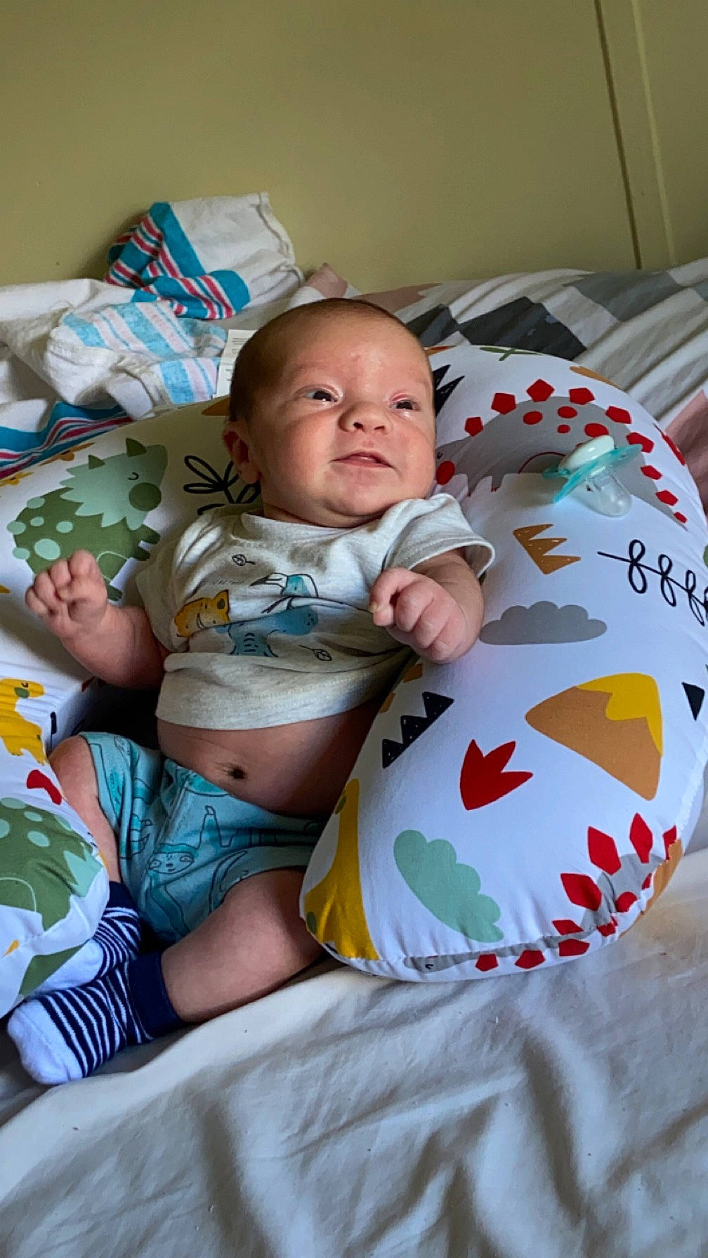 Braylen is registered to the contest to win money with this photo: abdomen, baby, baby_toddler_clothing, bedding, cheek, child, comfort, eye, finger, hand, happy, human_leg, linens, mouth, person, skin, stomach, textile, thigh, toddler
