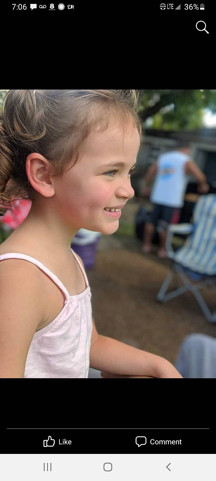 Gabrielle is registered to the contest to win money with this photo: chair, cheek, chin, cool, eyebrow, face, flash_photography, fun, grass, happy, iris, joy, leisure, lip, nose, person, shoulder, skin, smile, t_shirt