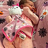 Calliope joined the competition — help win amazing prizes! baby, sleeping, plush_toy, blanket, pink, onesie, cute, cozy, soft, infant, child, comfort, rest, toy, pattern, ghost, spiderweb, nap, peaceful, bedtime