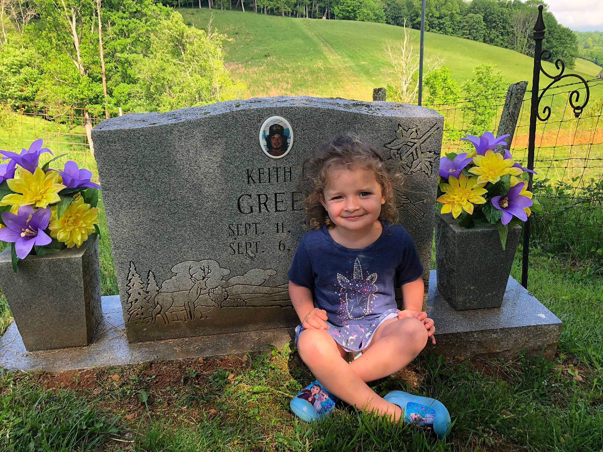 Lakelyn joined the competition — help win amazing prizes! automotive_wheel_system, child, fictional_character, flower, garden, grass, grass_family, grave, headstone, headwear, joy, memorial, nonbuilding_structure, person, plant, spring, toddler, violet_family, wheel, wildflower
