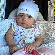 Calissi joined the competition — help win amazing prizes! baby, infant, car_seat, blanket, hat, clothing, face, eyes, hand, cute, child, baby_dior, sitting, portrait, cozy, warm, indoor, safety, soft, expression