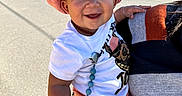 Sincere joined the competition — help win amazing prizes! adult, baby, beads, cars, child, close_up, driveway, happy, holding, houses, outdoor, photograph, pink_hat, pink_pants, portrait, residential, smiling, sunny, toy, white_shirt