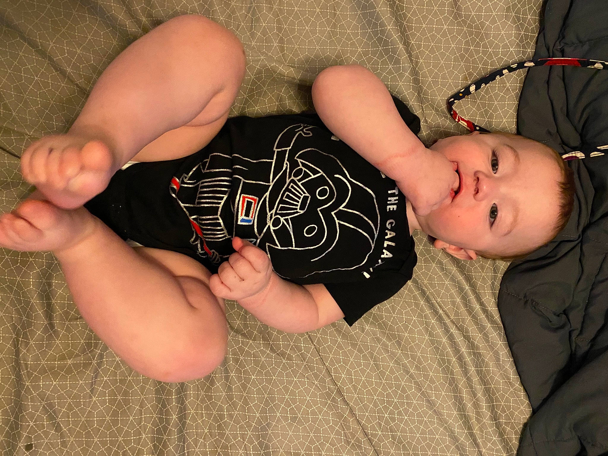 Brayden is registered to the contest to win money with this photo: baby_toddler_clothing, black_hair, cool, dress, eye, facial_expression, finger, gesture, glasses, hand, headgear, human_body, leaf, leg, nail, neck, person, skin, sleeve, thigh