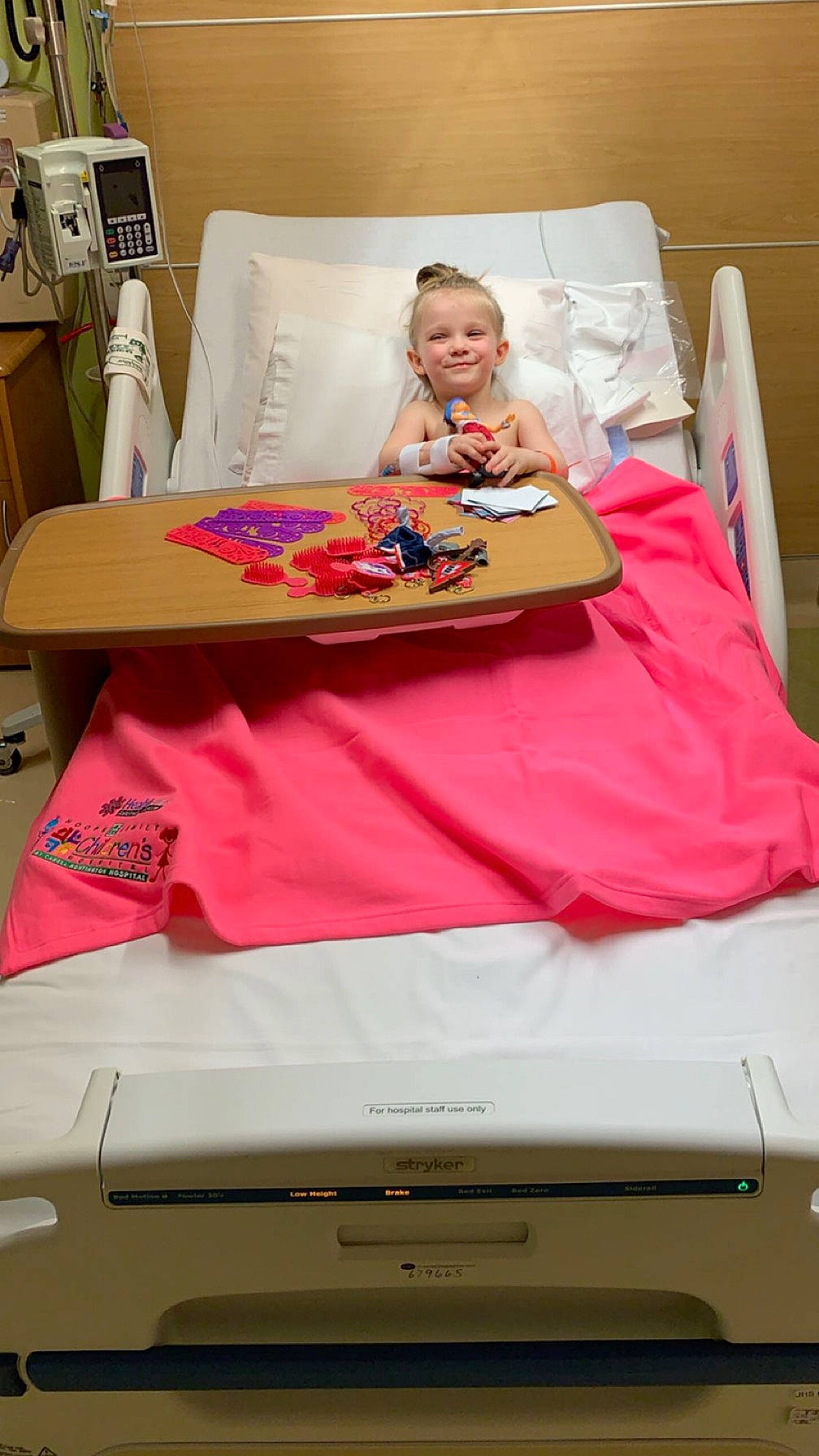 Paysleigh Sue is registered to the contest to win money with this photo: art, automotive_exterior, baby, child, comfort, gadget, home_appliance, joy, kitchen_appliance, linens, machine, magenta, motor_vehicle, office_equipment, paper, paper_product, person, pink, room, t_shirt