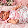 baby, infant, child, portrait, lying_down, pink, flower_headband, polka_dot_outfit, blanket, teddy_bear, flowers, bouquet, nursery, indoors, cute, awake, smiling, fashion, soft_lighting, photography