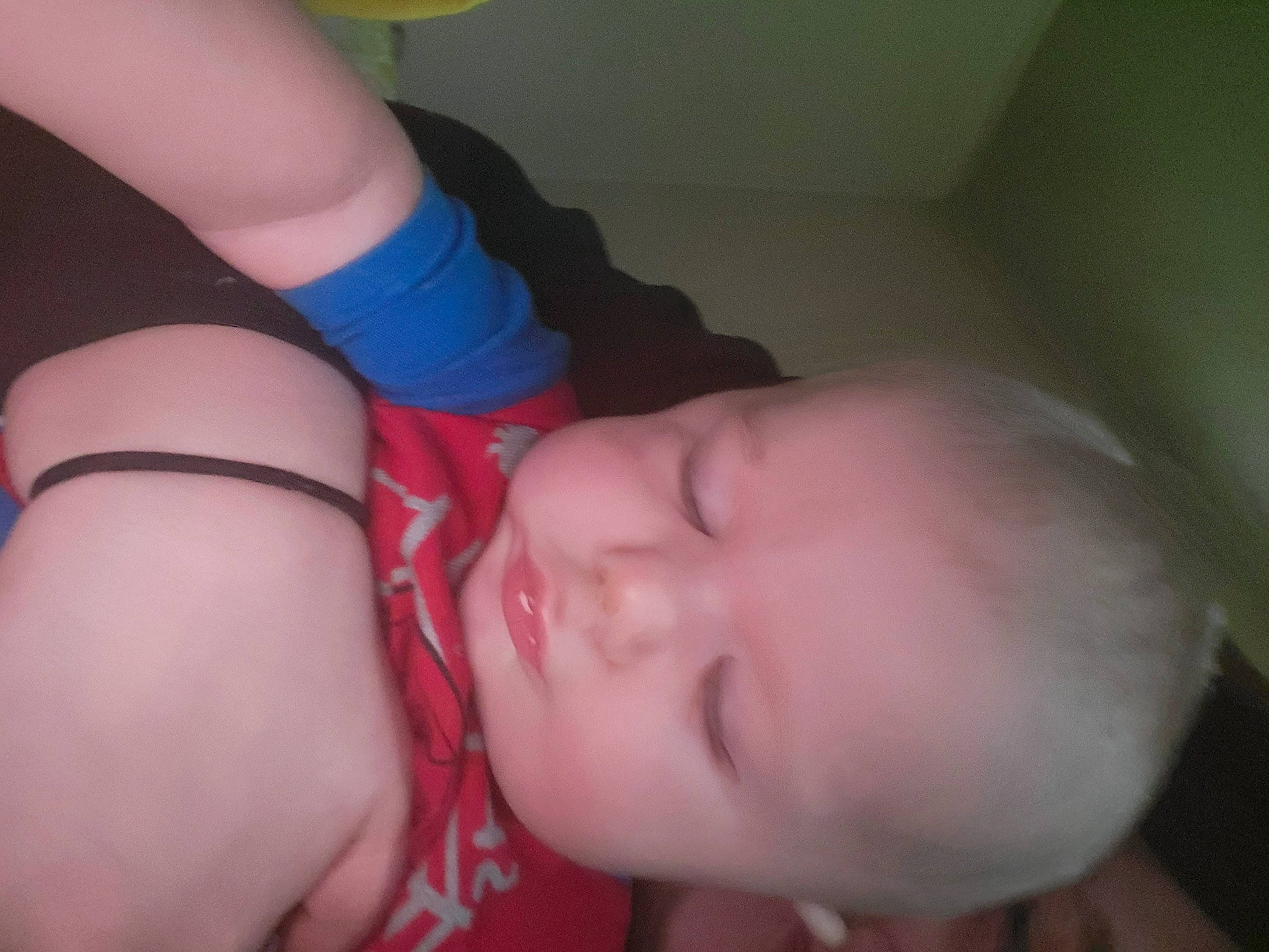 Jacob is registered to the contest to win money with this photo: arm, baby, baby_toddler_clothing, cheek, eyelash, finger, gesture, hand, human_body, joint, leg, lip, mouth, muscle, nail, neck, nose, person, skin, thumb