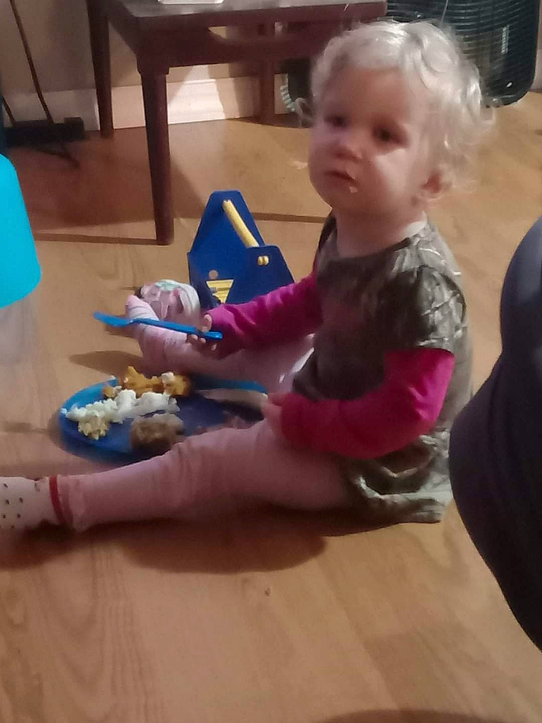 Becca-ann is registered to the contest to win money with this photo: baby, baby_toddler_clothing, chair, child, event, finger, flooring, fun, head, human_leg, joint, junk_food, lap, person, play, room, sitting, toddler, toy, vacation