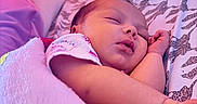 Lillie joined the competition — help win amazing prizes! baby, sleeping, blanket, bed, child, infant, peaceful, soft, pattern, fabric, arm, face, indoor, cozy, colorful_lighting, nap, cute, resting, person, pajamas