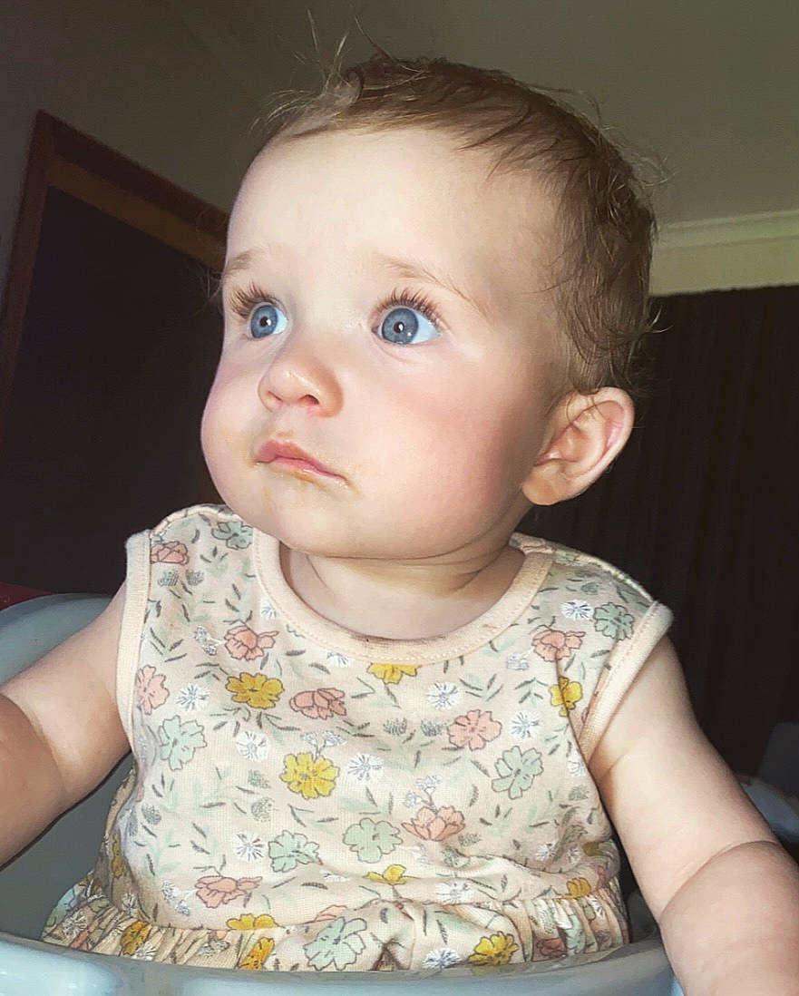 Eve joined the competition — help win amazing prizes! baby, baby_toddler_clothing, cheek, child, chin, dress, ear, eyebrow, eyelash, fun, human_body, iris, lip, mouth, neck, nose, person, sitting, skin, sleeve
