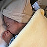 newborn, baby, sleeping, blanket, hat, hand, cozy, soft, infant, rest, closeup, warm, cute, child, wrapped, indoors, peaceful, portrait, knit, comfort