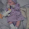 Kalena joined the competition — help win amazing prizes! baby, infant, child, portrait, lying_down, bed, blanket, quilt, purple_clothing, bonnet, socks, plush_toy, toy, smiling, face, indoors, bedroom, cozy, casual_photo, playtime