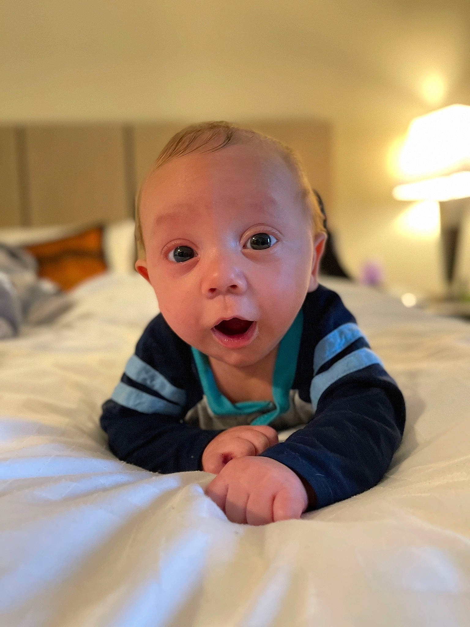 Jasper joined the competition — help win amazing prizes! baby, baby_toddler_clothing, cheek, comfort, dress, eye, face, flash_photography, floor, flooring, happy, head, human_body, lamp, nose, person, skin, sleeve, smile, surprise