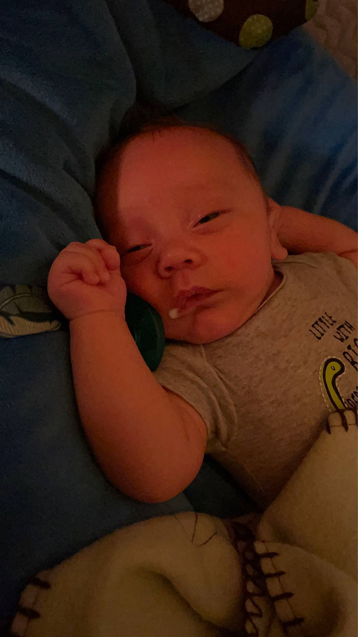 Jasper is registered to the contest to win money with this photo: arm, baby, cheek, chin, comfort, ear, elbow, eyebrow, finger, forehead, gesture, human_body, iris, mammal, mouth, neck, nose, person, skin, sleeve
