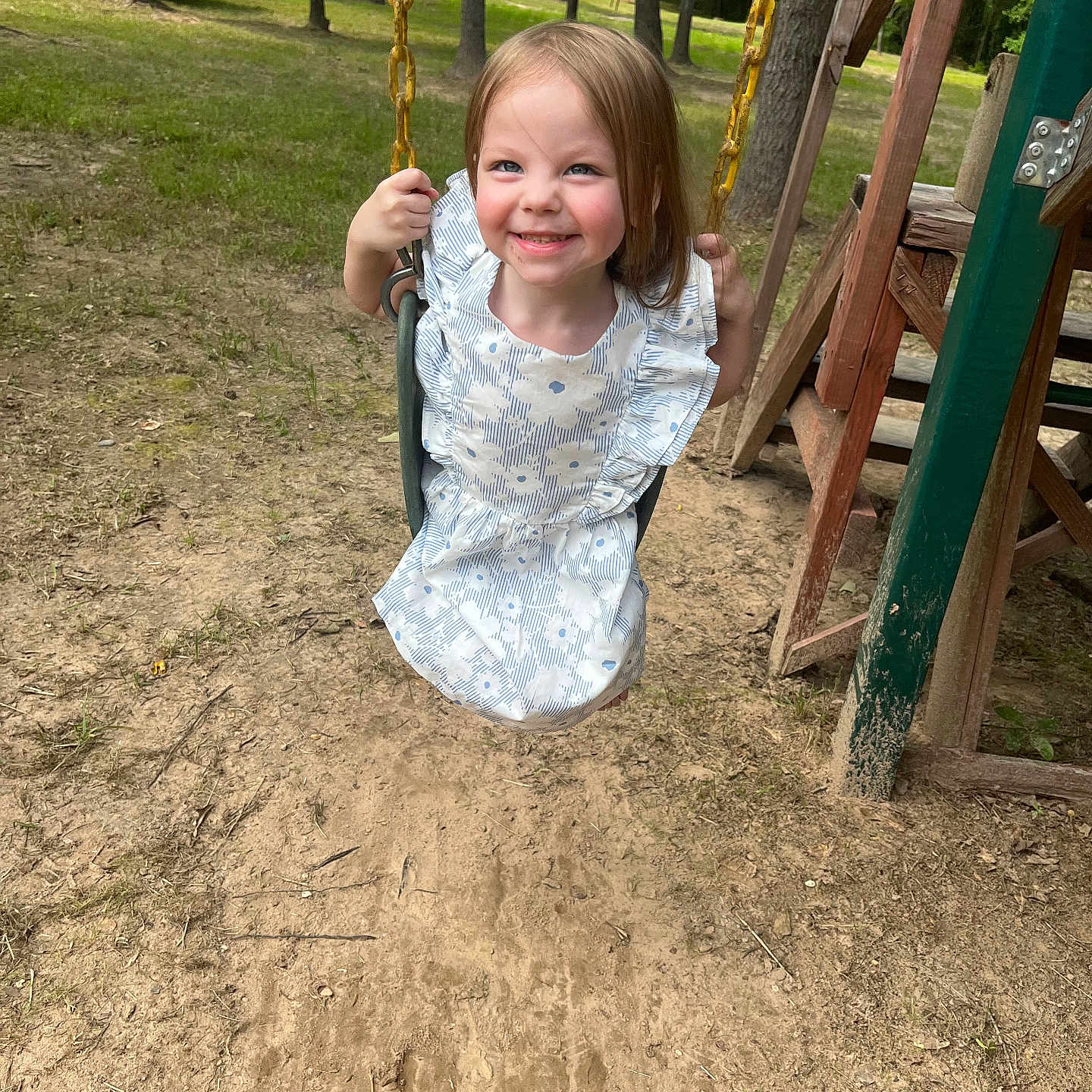 Olivia is registered to the contest to win money with this photo: child, clothing, dress, face, female, girl, grass, head, nature, outdoorplayarea, outdoors, park, person, photography, plant, playarea, portrait, soil, tree, vegetation