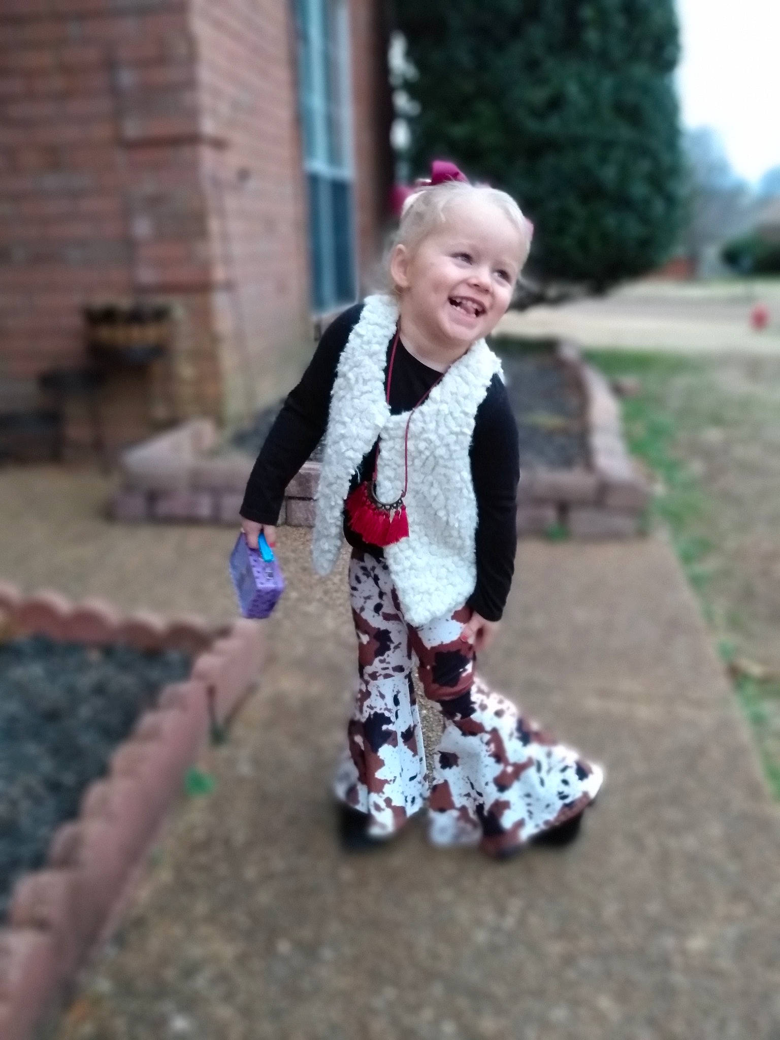 Lydia is registered to the contest to win money with this photo: child, dress, electric_blue, eye, fun, grass, hair, happy, joy, leisure, magenta, pattern, people_in_nature, person, pink, plant, recreation, smile, spring, street_fashion