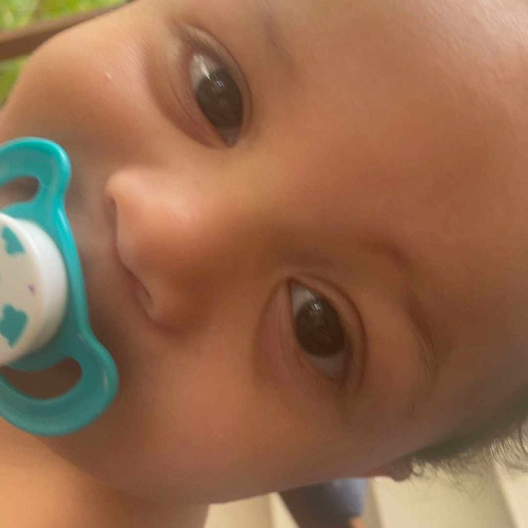 Myair joined the competition — help win amazing prizes! baby, child, close_up, curly_hair, cute, expression, eyes, face, furniture, head, indoor, infant, mouth, nose, outdoor, pacifier, person, portrait, skin, young_child