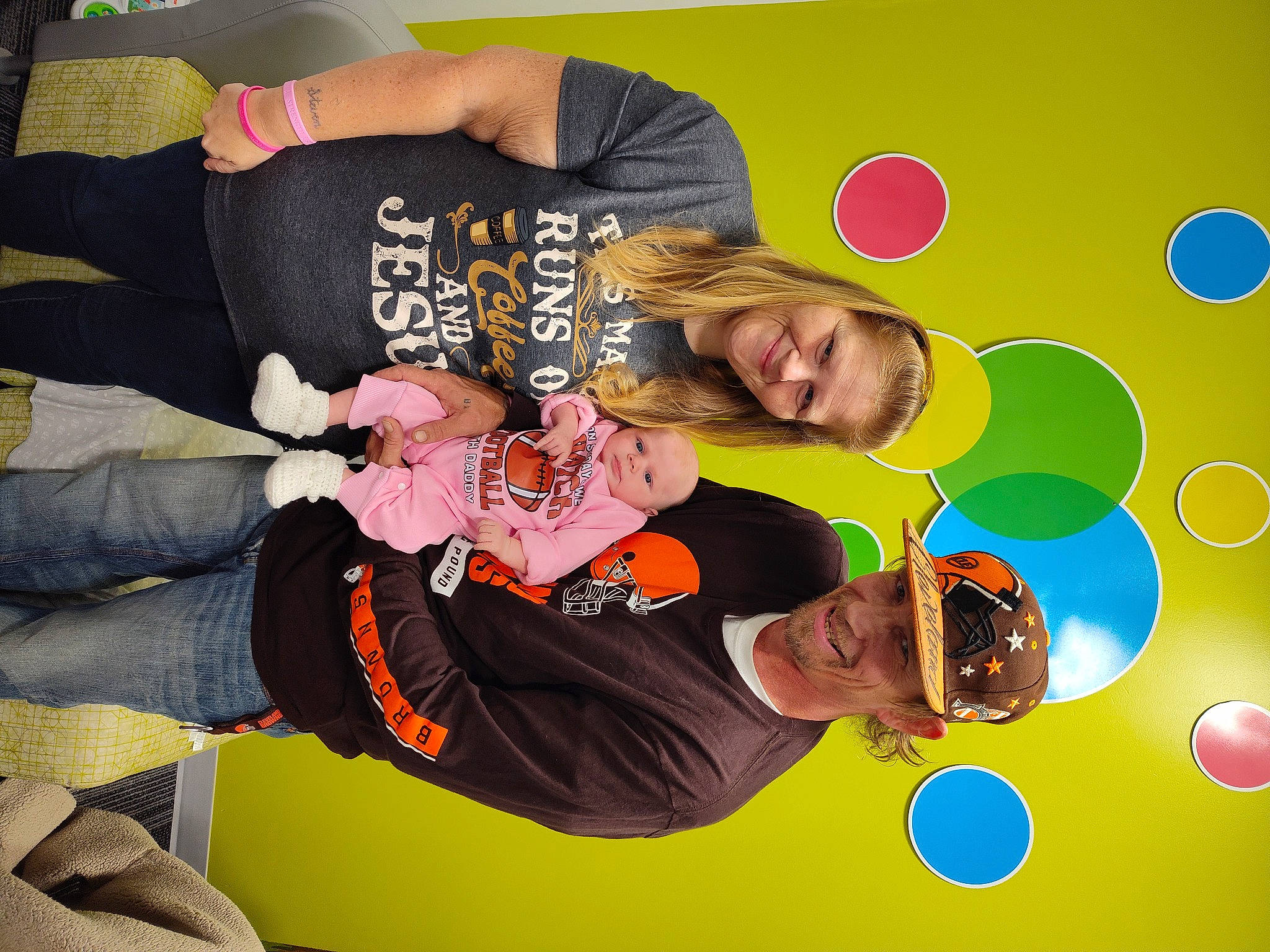 Jolie is registered to the contest to win money with this photo: circle, event, font, fun, gesture, graphics, happy, headwear, joy, leisure, person, sleeve, smile, t_shirt, wrist