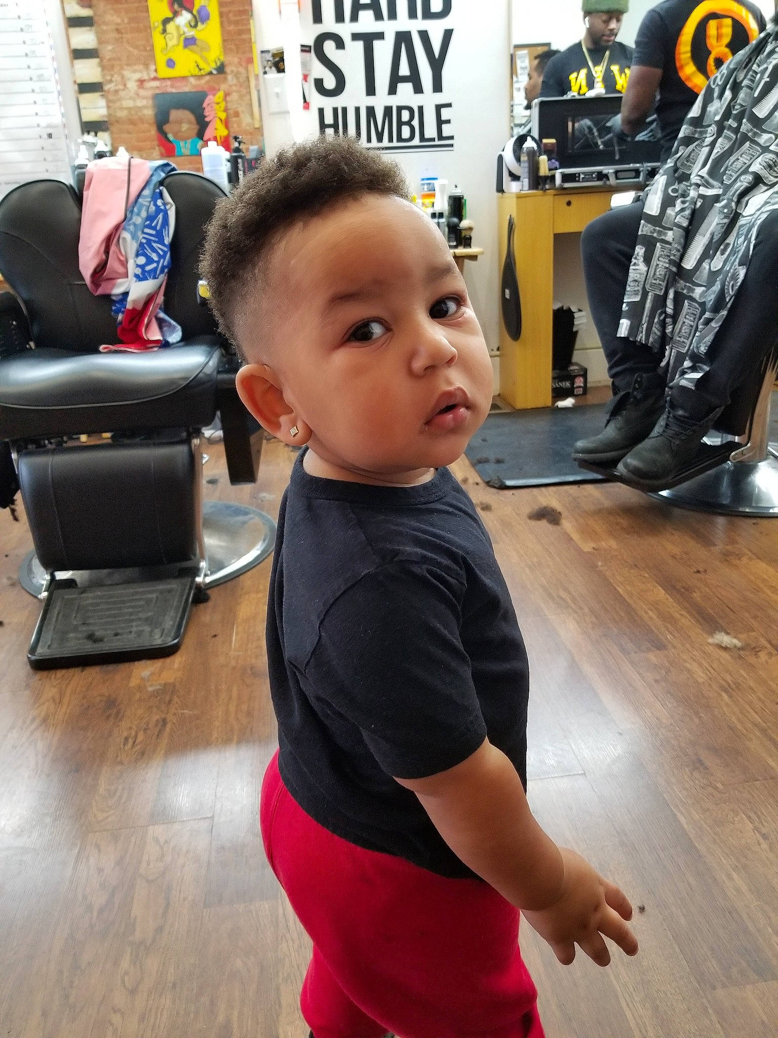Jamar is registered to the contest to win money with this photo: arm, boy, child, day, flooring, fun, girl, hair, hairstyle, leg, neck, person, physical_fitness, product, room, shoulder, standing, toddler
