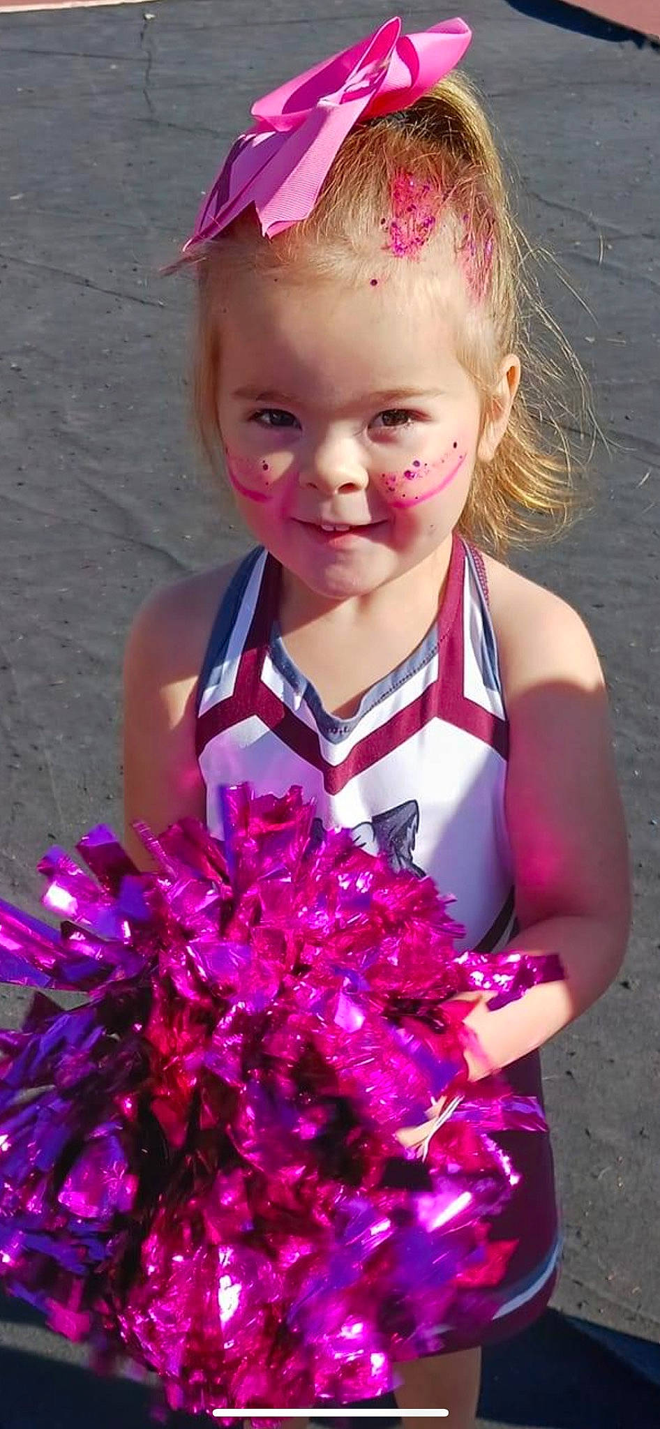 Beverly is registered to the contest to win money with this photo: baby_toddler_clothing, beauty, blond, blue, child, clothing, dress, electric_blue, facial_expression, fashion_accessory, fun, happy, magenta, person, petal, pink, purple, red, smile, toddler