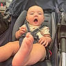 Everly joined the competition — help win amazing prizes! baby, stroller, foot, infant, child, seatbelt, fabric, expression, mouth_open, indoor, person, clothing, comfort, playful, young_child, cushion, seat, casual, closeup, safety
