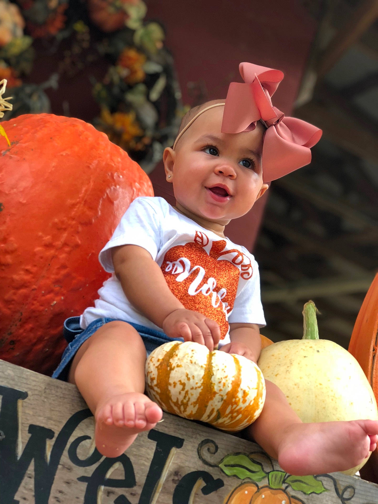 Nova is registered to the contest to win money with this photo: calabaza, child, eating, food, fun, girl, infant, person, pumpkin, smile, toddler, winter_squash