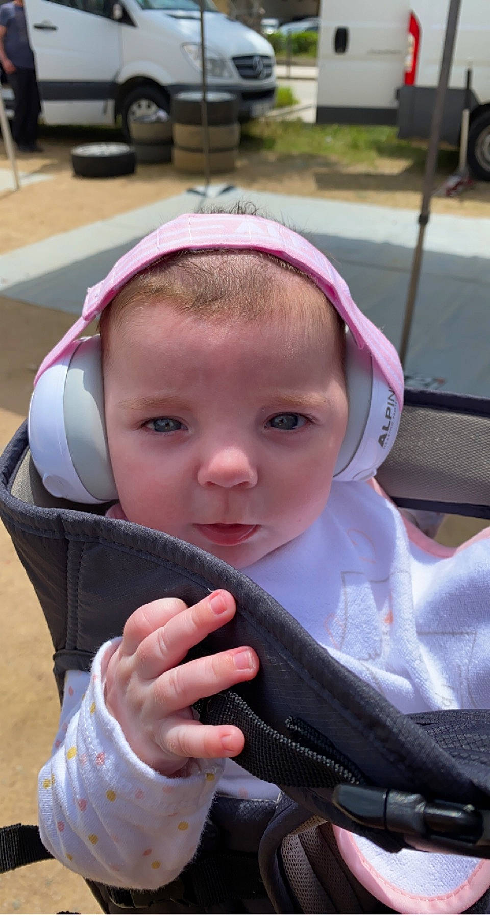 Livia a rejoint le concours — aidez-le/la à gagner de superbes lots ! audio_equipment, baby, baby_carriage, baby_products, cheek, child, chin, eyelash, eyewear, fashion_accessory, fun, happy, head, headgear, lip, person, personal_protective_equipment, sitting, skin, tire