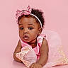 Malani is registered to the contest to win money with this photo: baby, girl, pink_dress, headband, bow, portrait, cute, child, infant, smiling, studio, photography, fashion, adorable, face, eyes, toddler, pose, soft, background