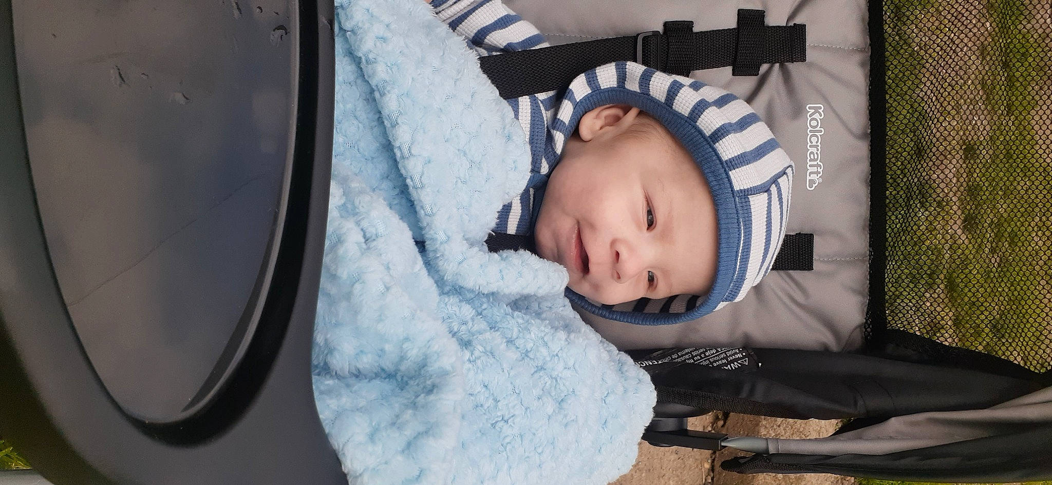 Christopher Jr. is registered to the contest to win money with this photo: baby, baby_carriage, baby_products, baby_safety, baby_toddler_clothing, cheek, child, comfort, fur, headwear, linens, nap, person, portrait_photography, room, sitting, sleep, toddler, tree, white