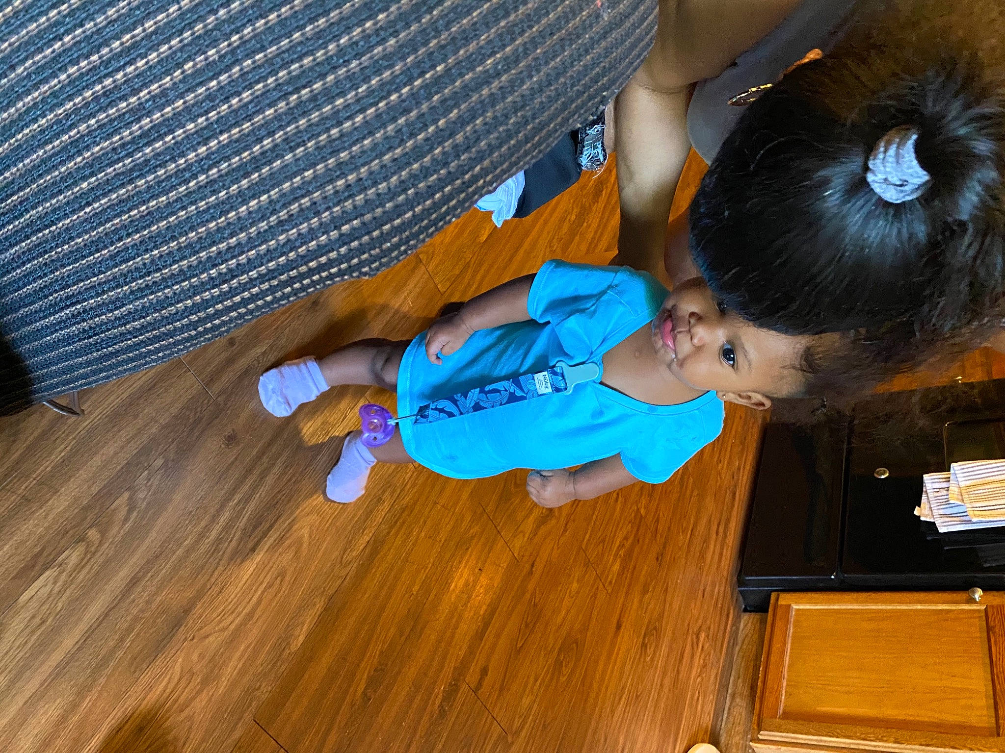 Kahlani is registered to the contest to win money with this photo: child, floor, flooring, hardwood, laminate_flooring, person, toddler, varnish, wood, wood_flooring