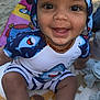 Ayaan a rejoint le concours — aidez-le/la à gagner de superbes lots ! baby, child, smiling, hat, outdoor, blanket, clothing, cute, happy, person, sitting, infant, portrait, face, headwear, playful, summer, sunlight, babywear, young