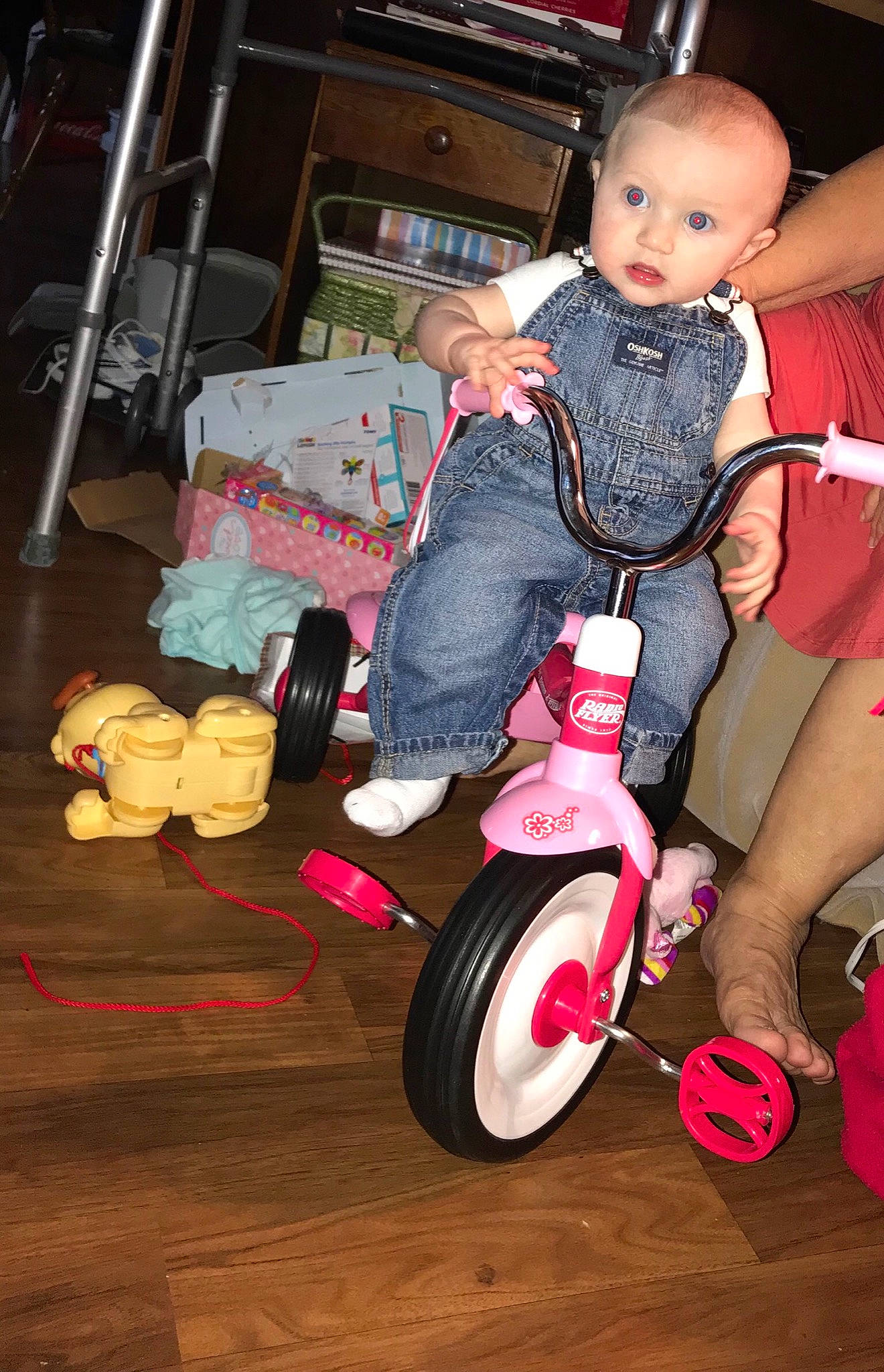 Aveire is registered to the contest to win money with this photo: baby_carriage, baby_products, car_seat, child, fun, girl, leg, person, product, sitting, surprise, toddler, tricycle, vehicle