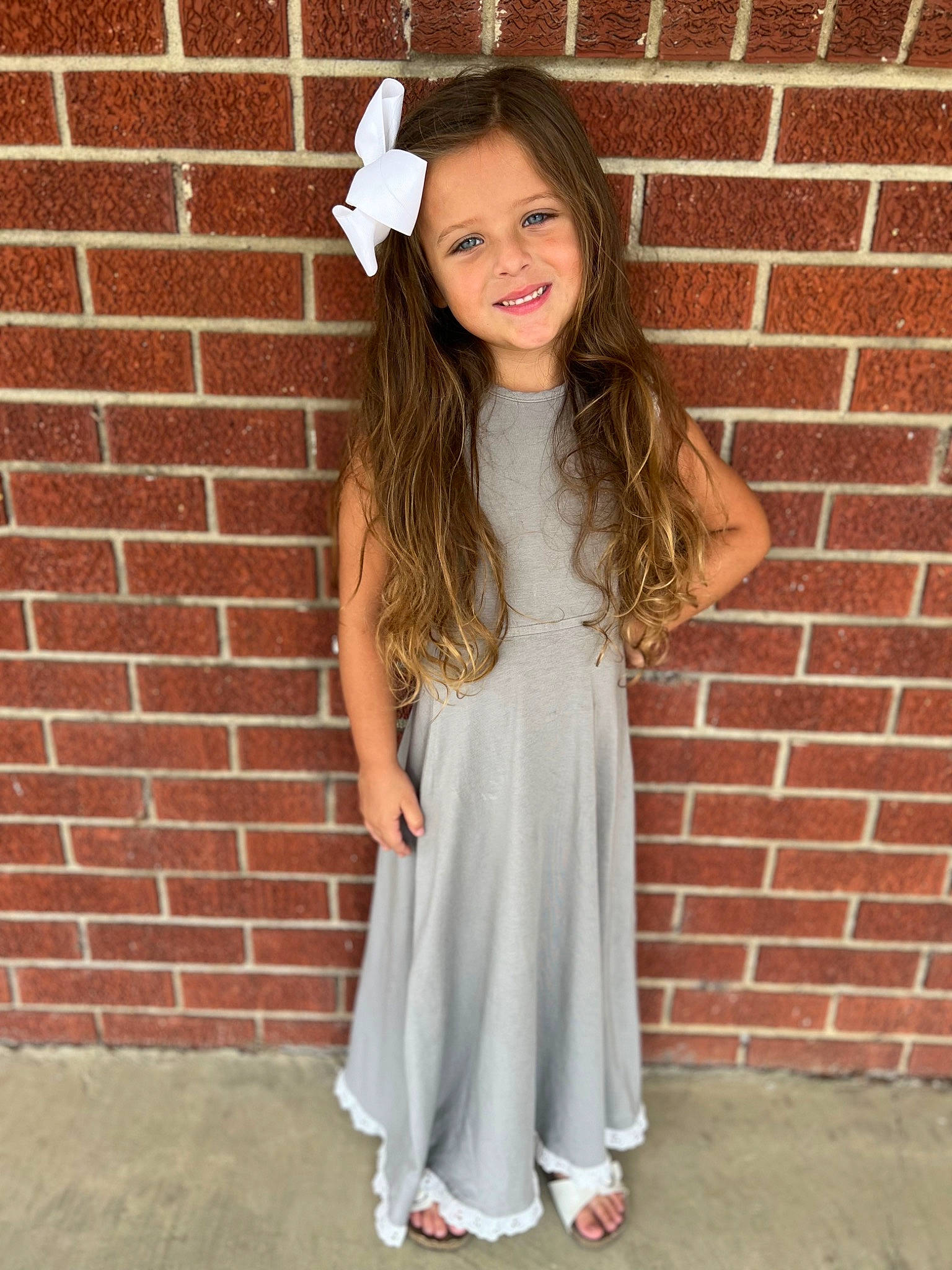 Kenli Pennington joined the competition — help win amazing prizes! arm, brick, day_dress, face, fashion_design, formal_wear, hairstyle, happy, head, jewellery, joy, long_hair, neck, orange, person, pink, sleeve, sleeveless_shirt, smile, t_shirt