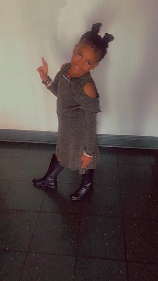 Kamorra is registered to the contest to win money with this photo: child, event, fashion_design, floor, flooring, fun, gesture, human_leg, knee, leg, pattern, person, room, sandal, shadow, sleeve, slipper, sock, thigh, toddler