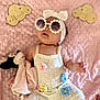 baby, infant, sunglasses, headband, dress, plush_toy, minnie_mouse, blanket, pink, flower, crochet, wooden_sign, milestone, cute, child, smile, lying_down, accessory, soft_toy, portrait