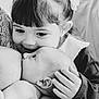 baby, child, black_and_white, portrait, infant, smiling, tenderness, love, family, cute, hair_clips, holding, close_up, affection, sibling, candid, expression, young_girl, skin, hand