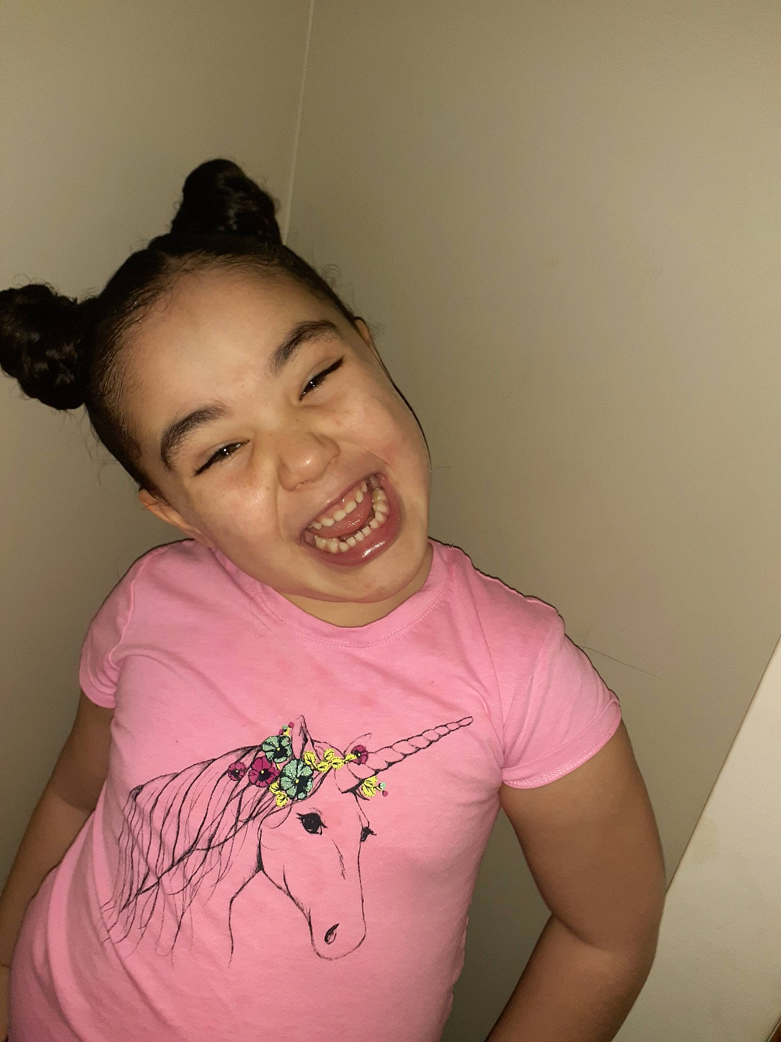Aleena is registered to the contest to win money with this photo: cheek, child, cool, ear, face, facial_expression, forehead, fun, happy, joint, lip, mouth, neck, nose, person, pink, shoulder, skin, smile, t_shirt