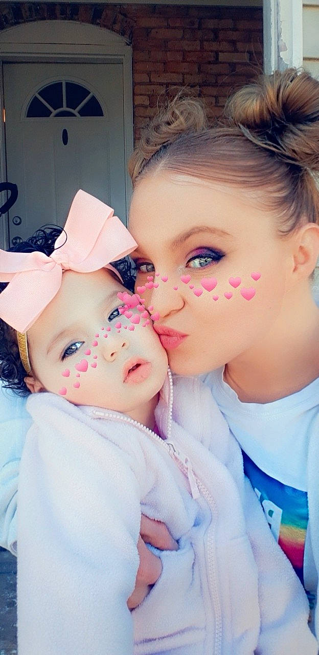 Celiah is registered to the contest to win money with this photo: baby, beauty, cheek, child, ear, eye, eyebrow, eyelash, face, forehead, gesture, hair, headwear, interaction, lip, nose, person, pink, selfie, skin