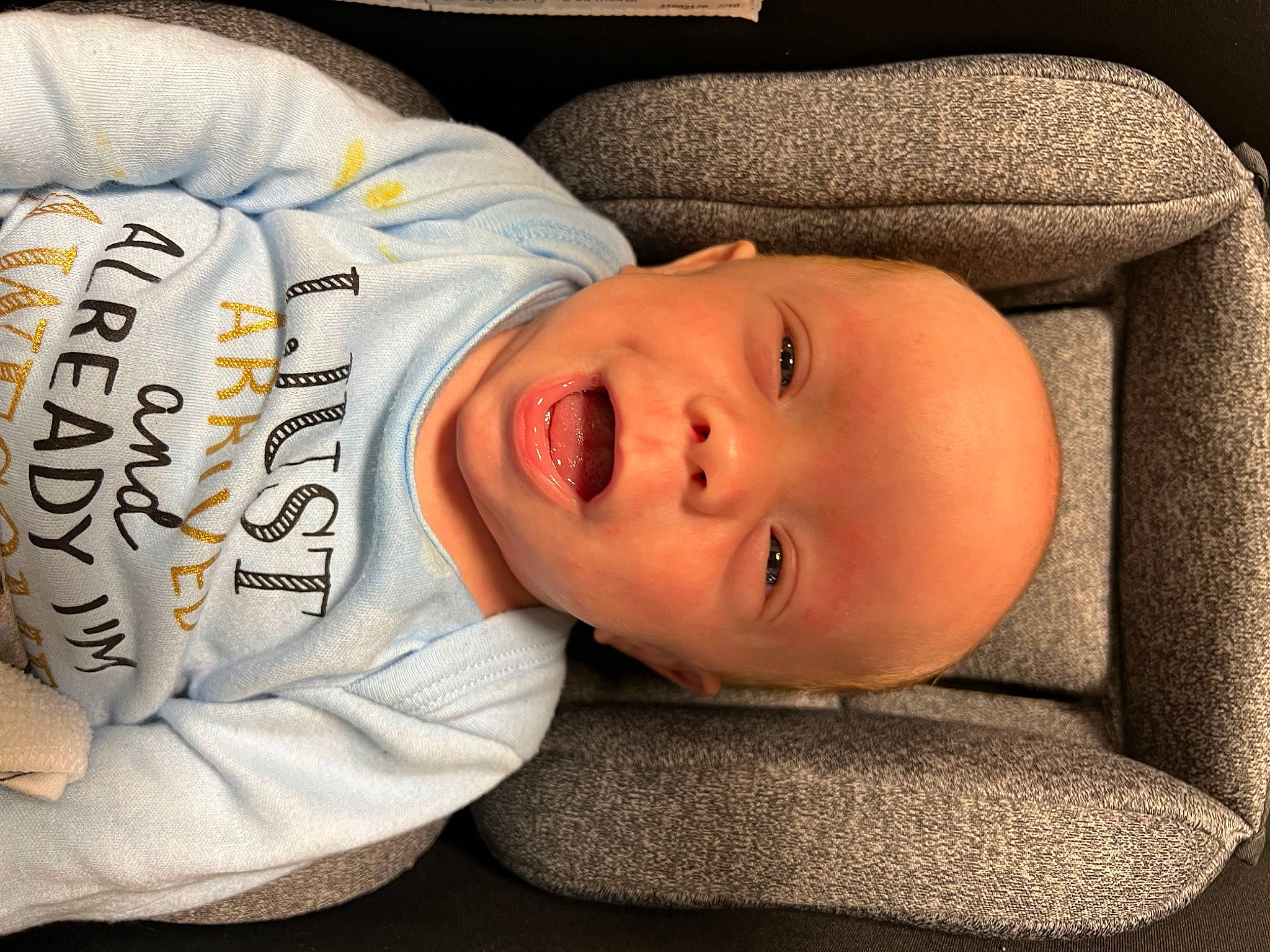 Emory joined the competition — help win amazing prizes! baby, baby_toddler_clothing, cheek, child, chin, comfort, flooring, person, sleeve, smile, toddler, wood