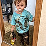 Judson joined the competition — help win amazing prizes! toddler, child, muddy, dirty_clothes, pacifier, toy, mickey_mouse, blue_tshirt, cowboy_print, black_pants, boots, indoor, doorway, carpet, wooden_floor, face, person, messy, expression, home