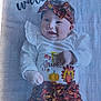 baby, infant, headband, smiling, clothing, pumpkin, turkey, blanket, fall_theme, patterned_pants, lying_down, cute, child, autumn_colors, portrait, happy, decor, fabric, person, holiday