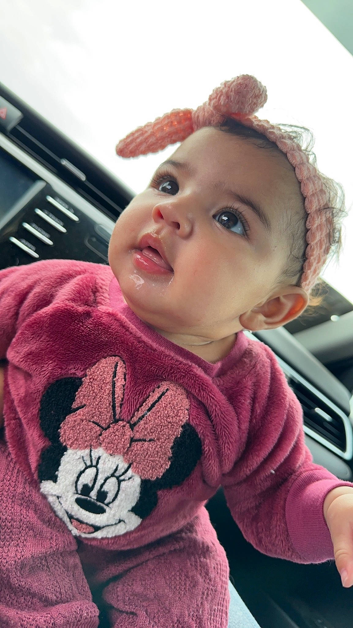 Armani is registered to the contest to win money with this photo: baby, baby_toddler_clothing, cap, cheek, child, chin, cool, eyelash, face, fashion_accessory, happy, lip, magenta, nose, outerwear, person, pink, skin, sleeve, toddler